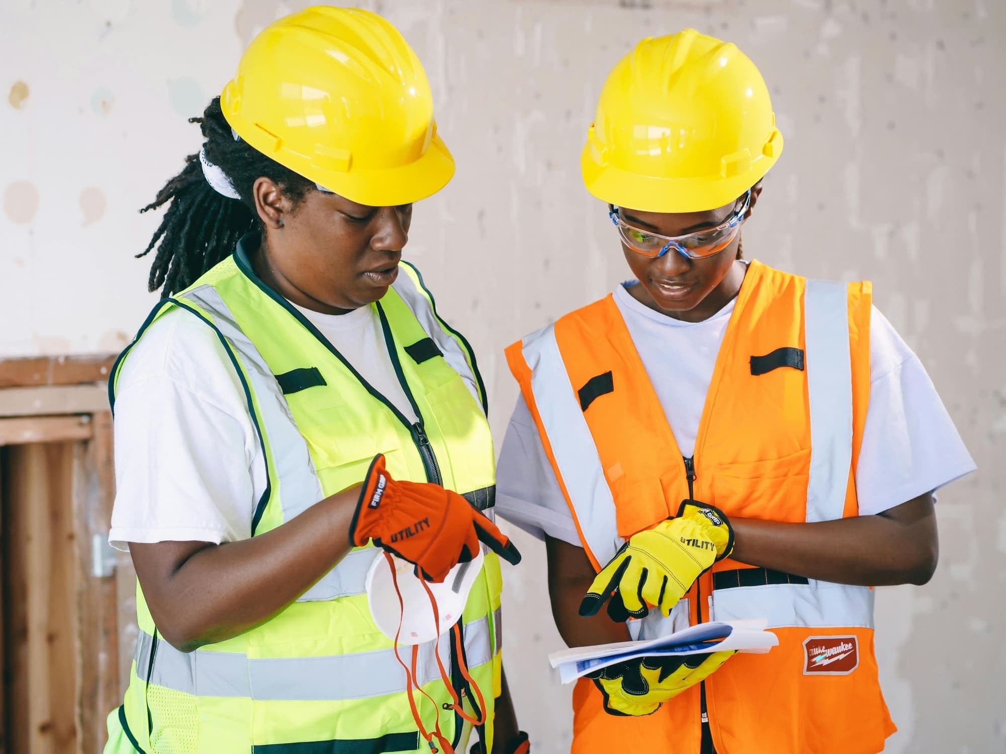 Installation crew wearing safety gear on site